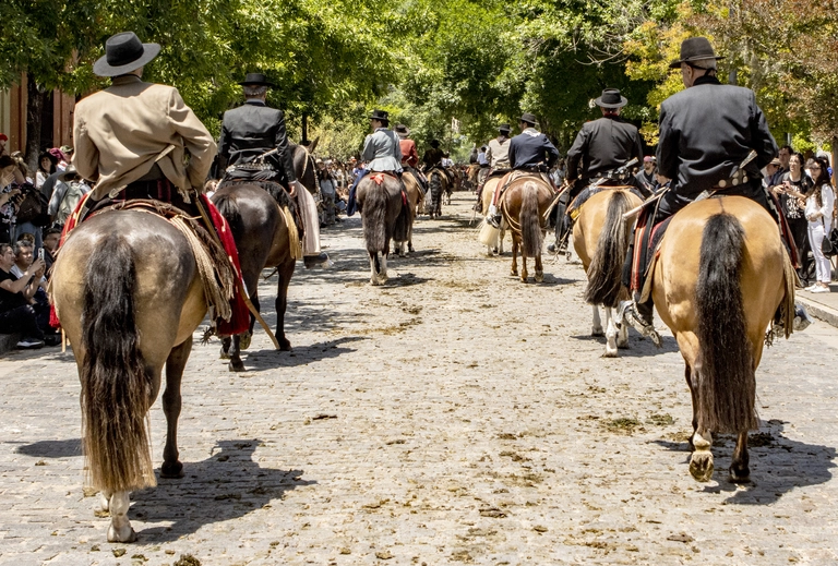 Gaucho parade crossing the bridge on Areco river